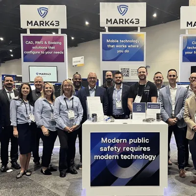 Blue Line Tech and Mark43 team at a conference booth
