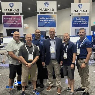 Blue Line Tech team at the Mark43 booth